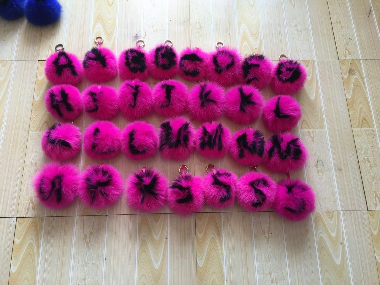 wholesale initial pom pom